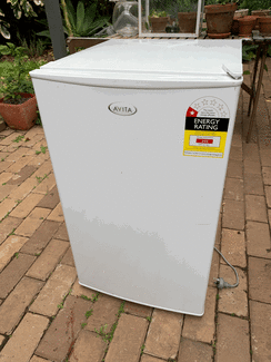 small fridge with water and ice dispenser