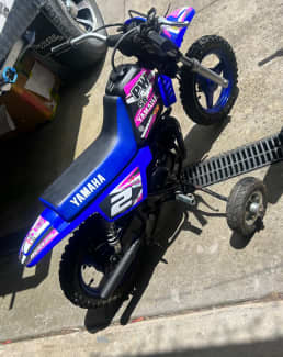 Pw50 dirt bike cheap with training wheels