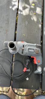 Ozito 710w hammer online drill