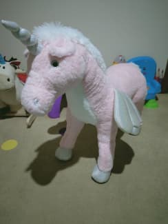 large pink unicorn stuffed animal