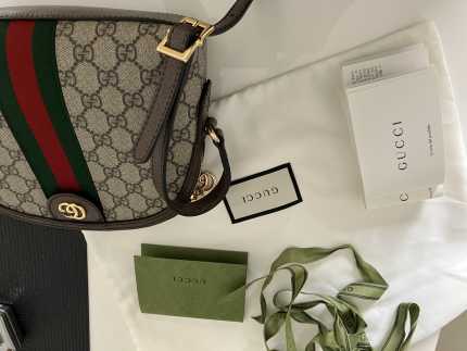 used gucci luggage