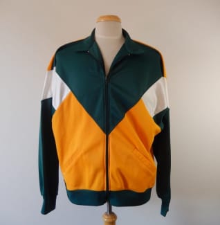 Green and store orange puma tracksuit