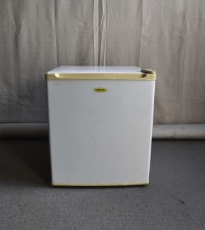 white and gold mini fridge