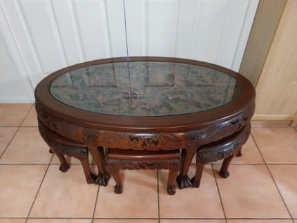 Oriental hand carved oval coffee table with 6 online stools