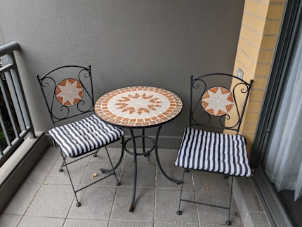 outdoor coffee table and two chairs