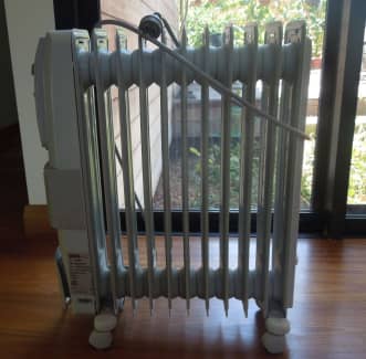 DeLonghi Oil filled Radiator Heater 2400W with Timer and Fan Air