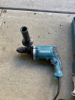 Makita hammer drill hp1631k hot sale