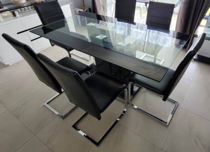 gumtree glass dining table and chairs