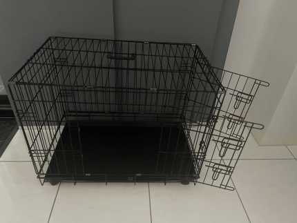 Dog crate on wheels