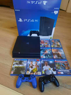 SALE] Sony PS4 Pro 1TB + 2x controllers and charger + 4 games