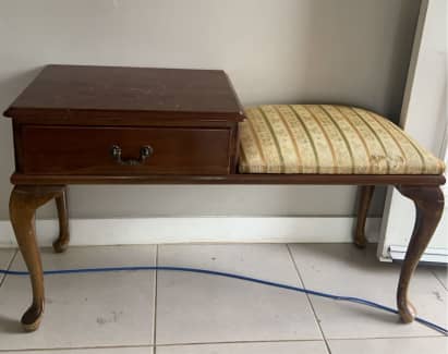 antique phone table with seat