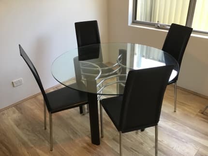 small glass and chrome dining table