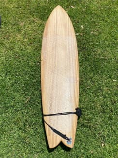 used seaside surfboard