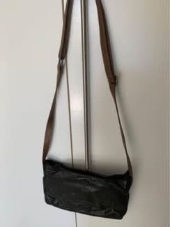 Sold at Auction: A GOOD BLACK LEATHER PRADA SOFT RUFFLE BAG. 29cm long.