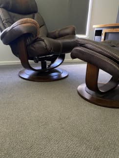 used brown leather armchair