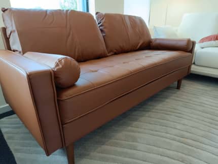 Gumtree tan outlet leather sofa