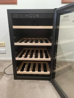 white fridge with stainless handles