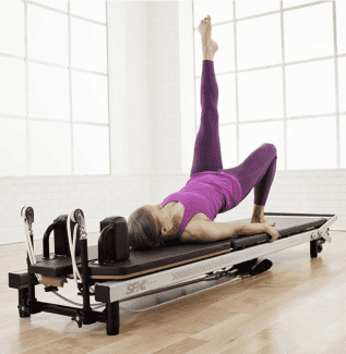 Exercise Pilates Reformer Machine Pilates Arc Wooden Spine Corrector -  China Pilates Chair and Pilates Reformer price