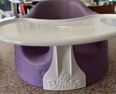 Purple bumbo seat with sales tray